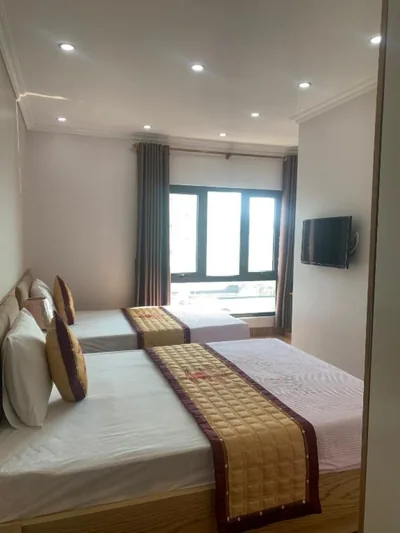 Habitación cuádruple — Thanh Tung Hotel